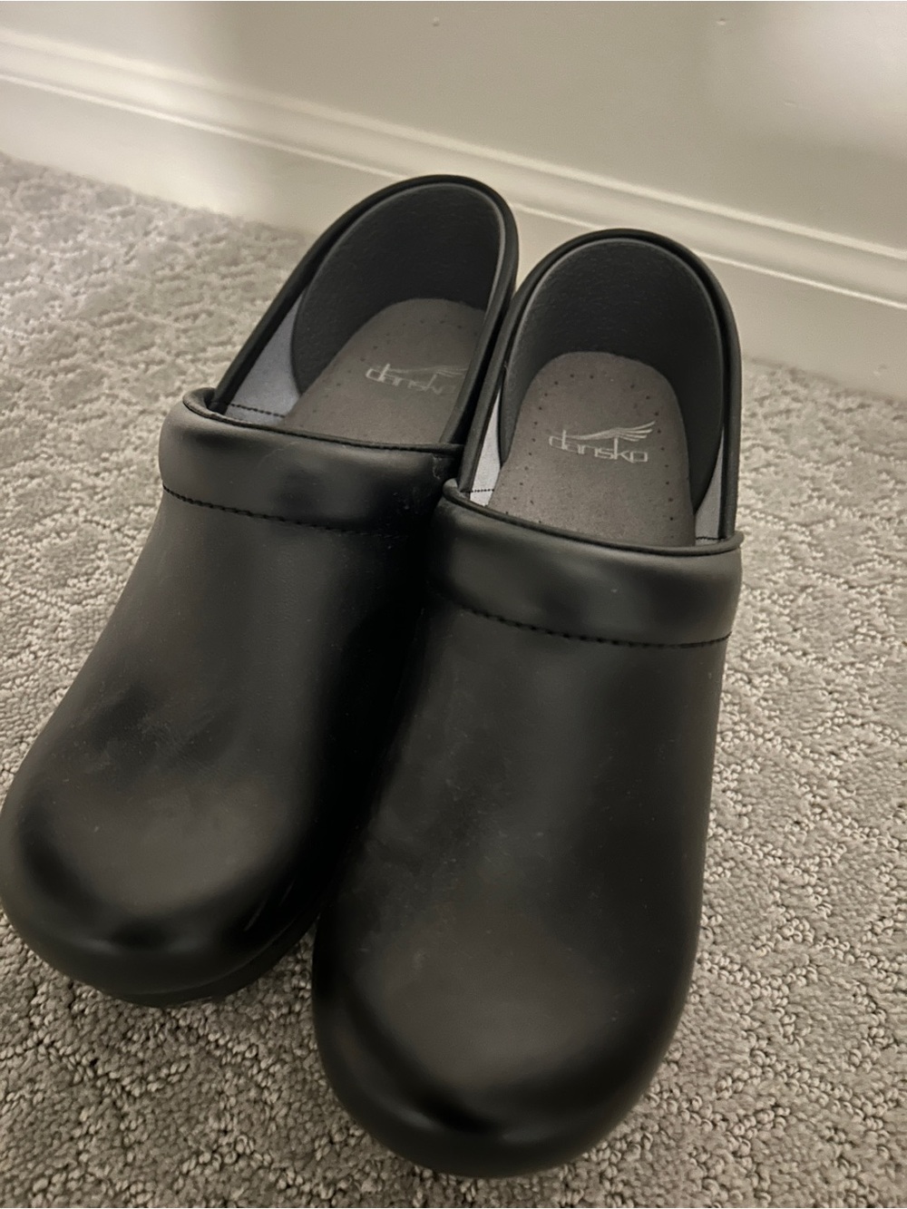 Dansko Black Slip-On Clogs
